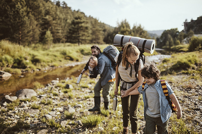 Family walking in a forest