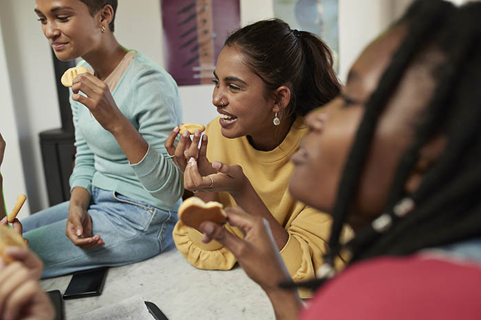 Group of women eating a snack
