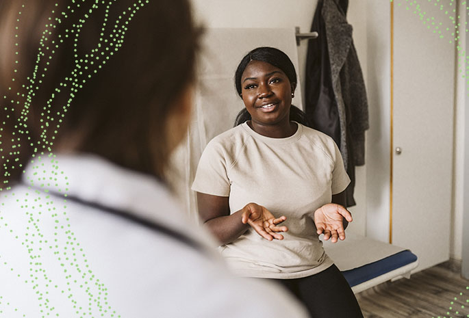 female patient chats with doctor