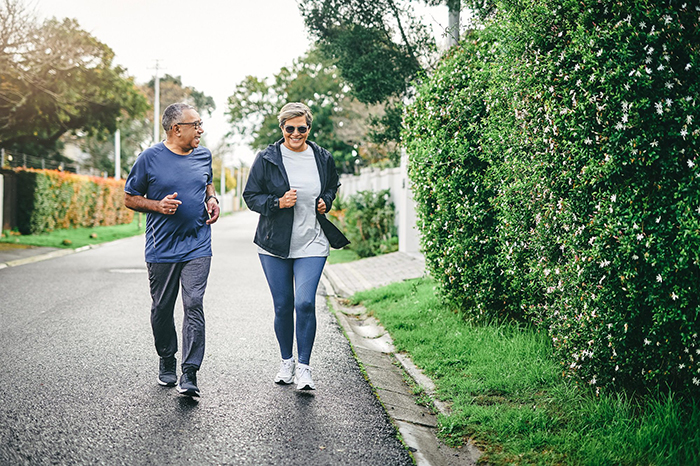 Couple jogging on a sunny day 
