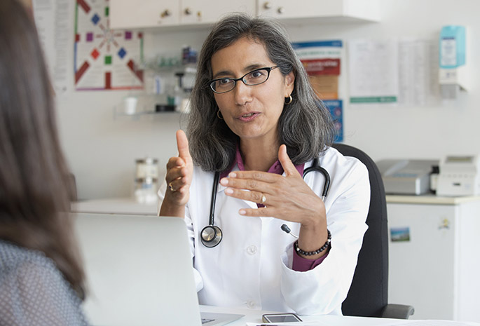 doctor explaining to a patient