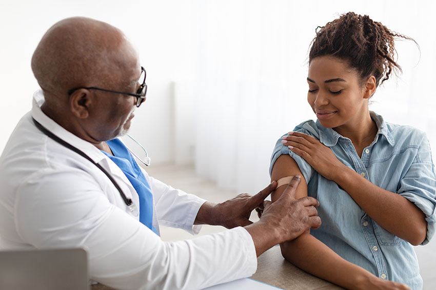 Woman receiving he annual flu shot 