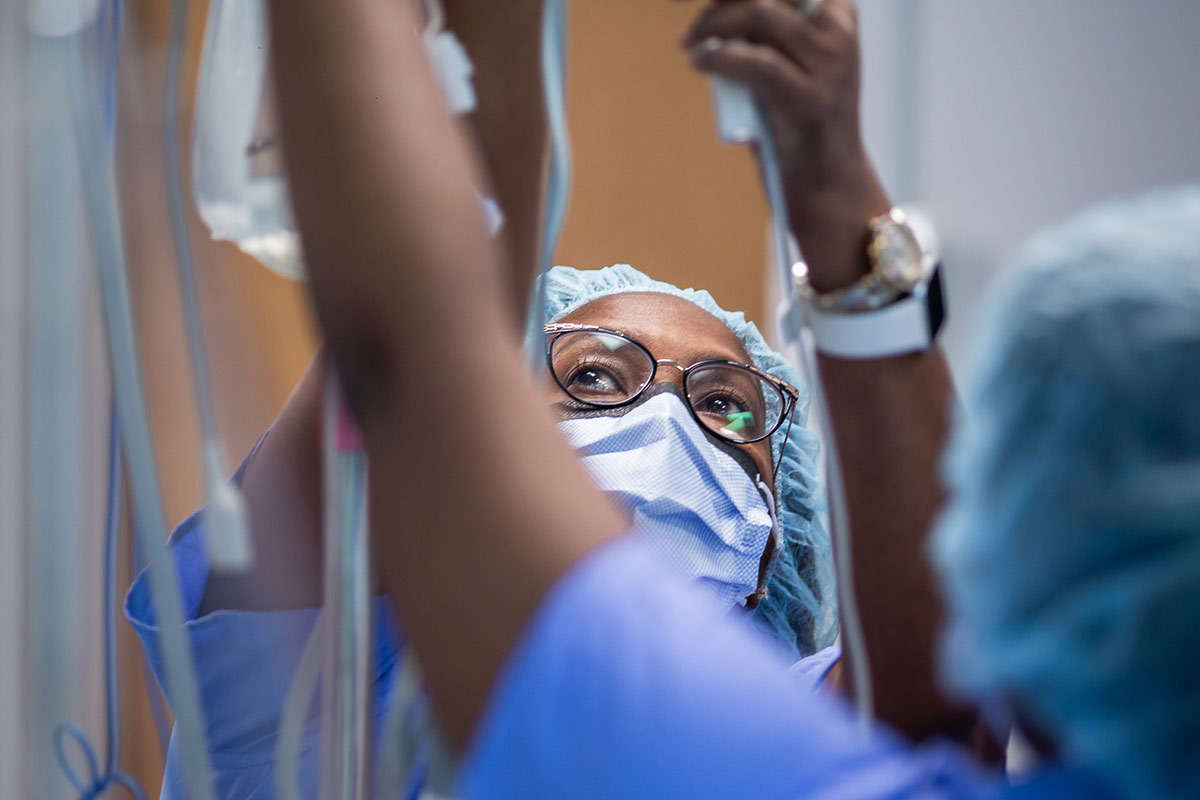 an emory nurse preparing an iv