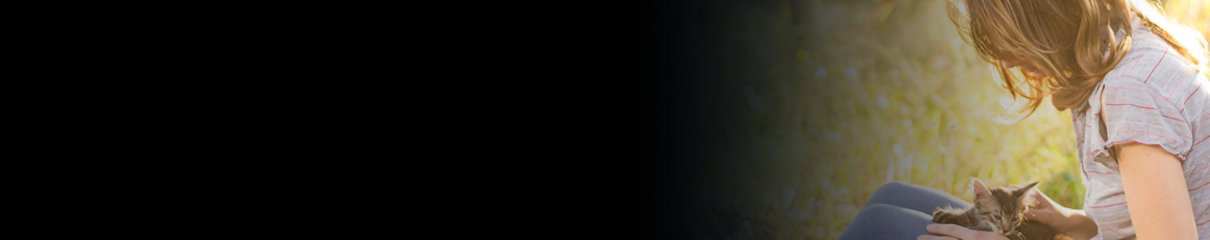 Female sitting in field