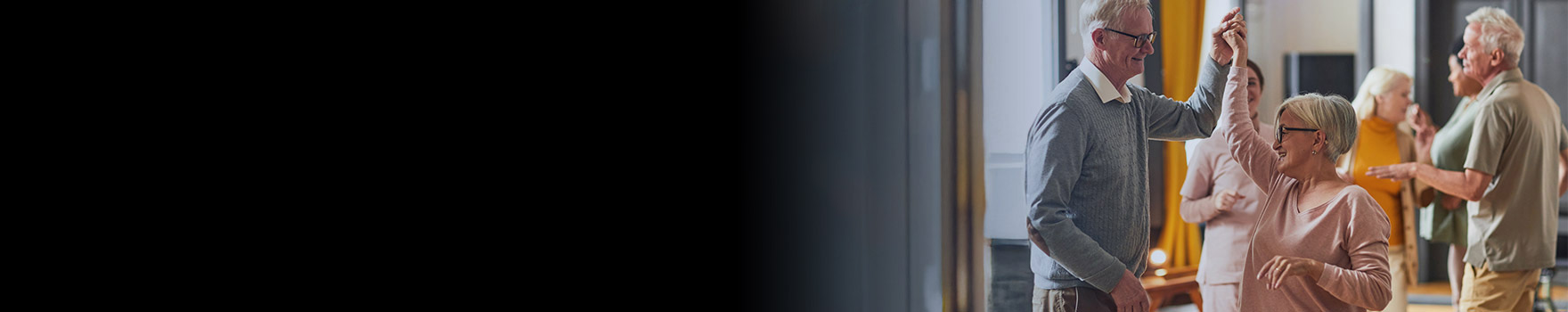 elderly couple dancing