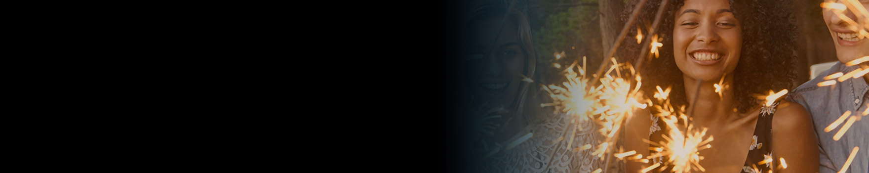 woman in front of sparklers