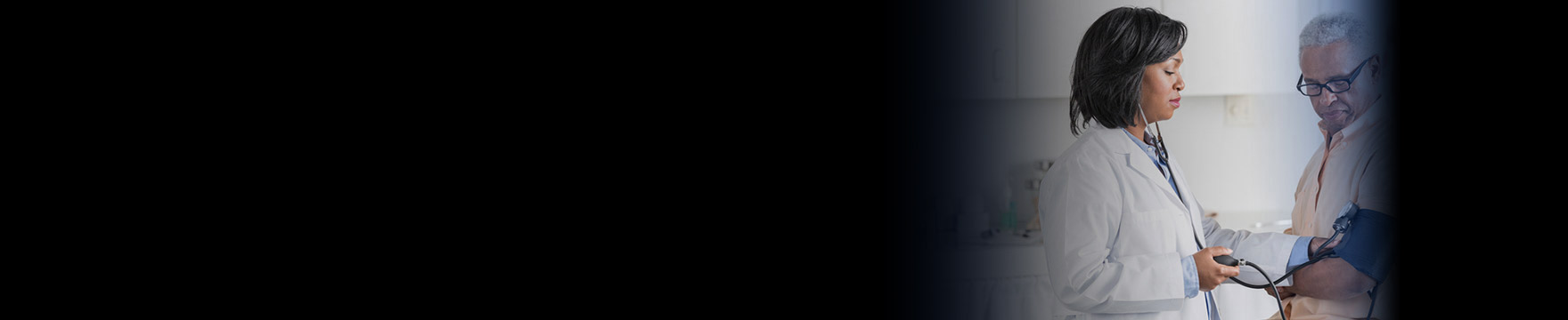 female doctor checking patient's blood pressure