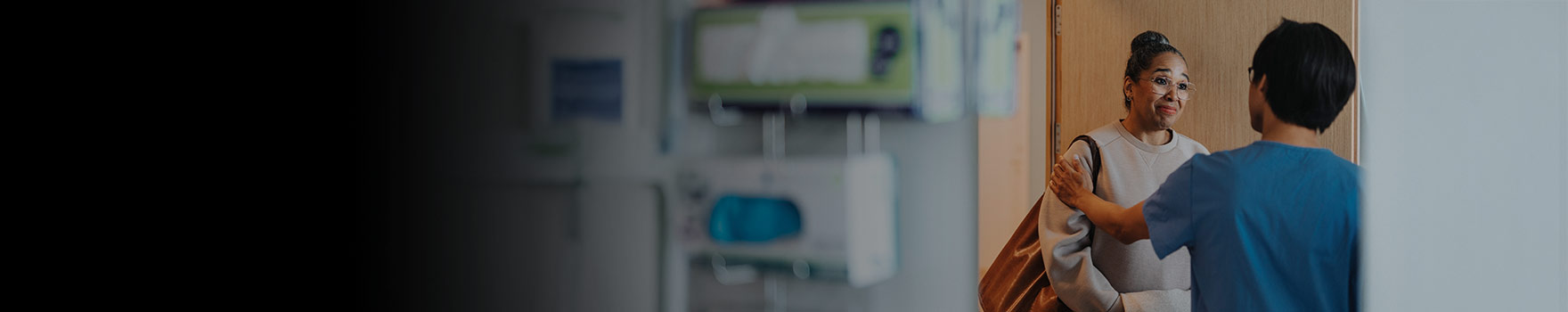 Nurse and patient inside a clinic