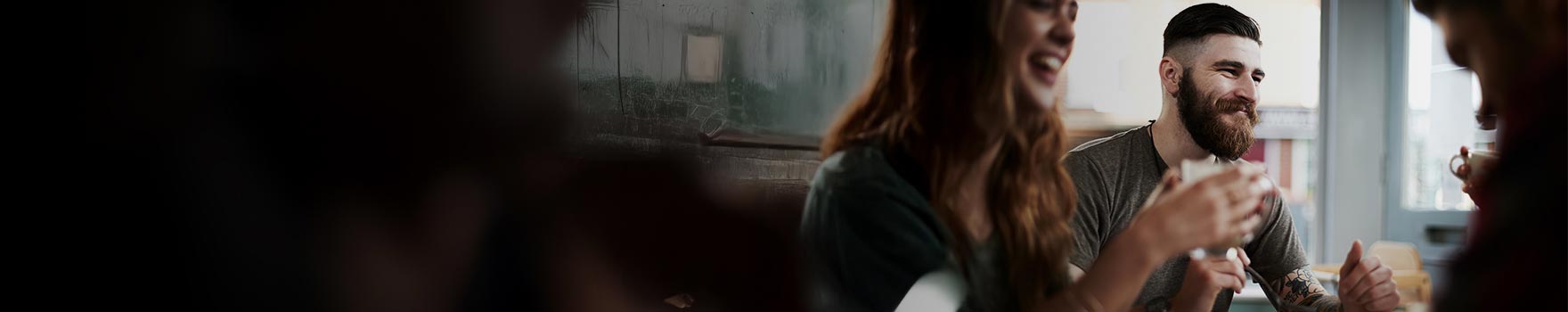 A group of friends eating at a restaurant