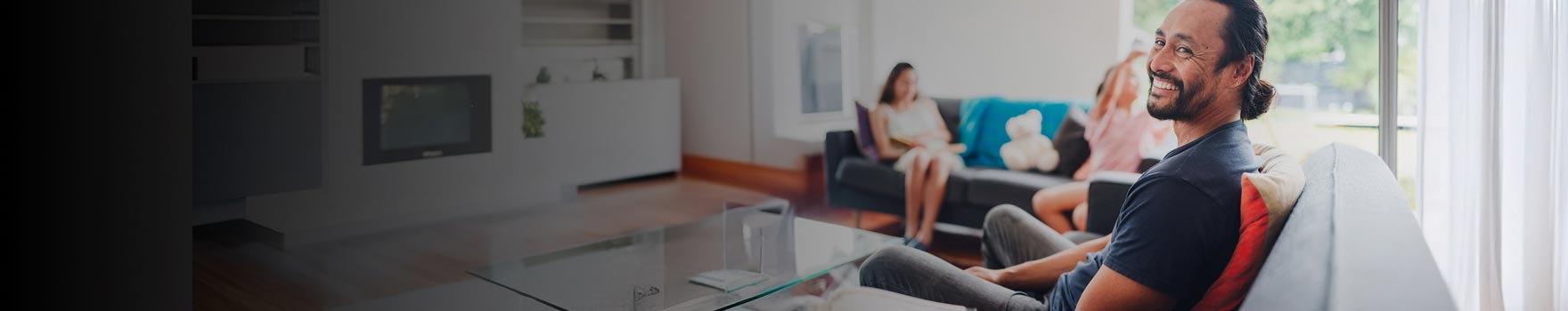 A family enjoying their time in the living room