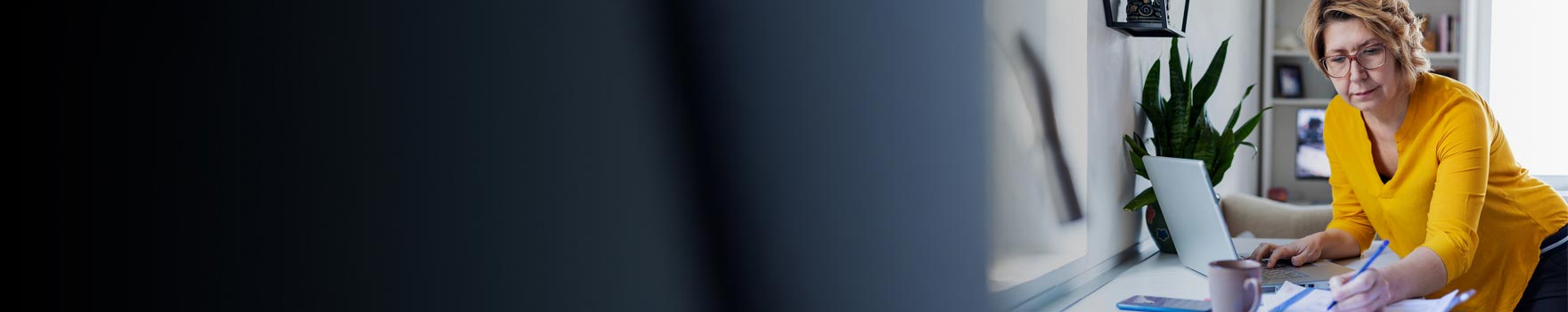 Woman writing down information