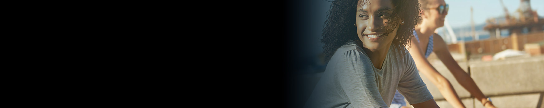 young women riding bicycles outdoors