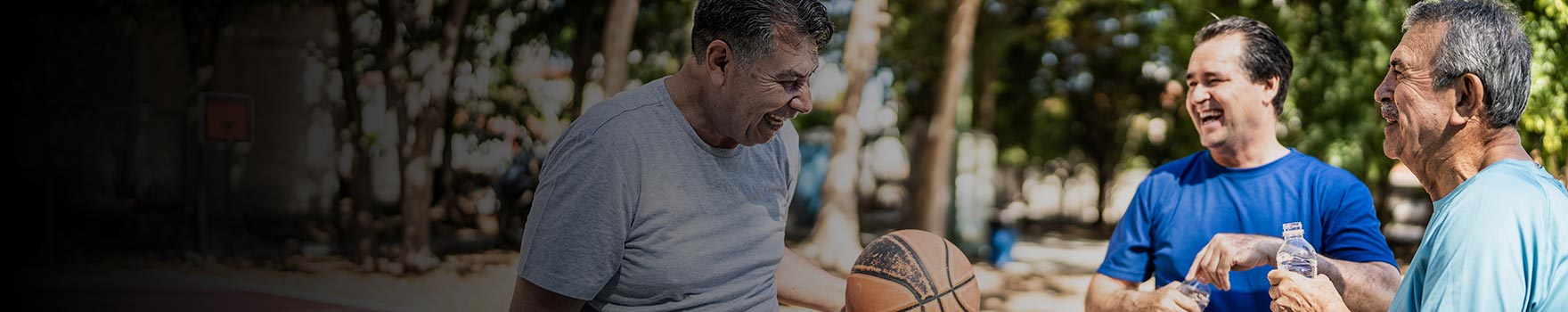 Men playing basketball