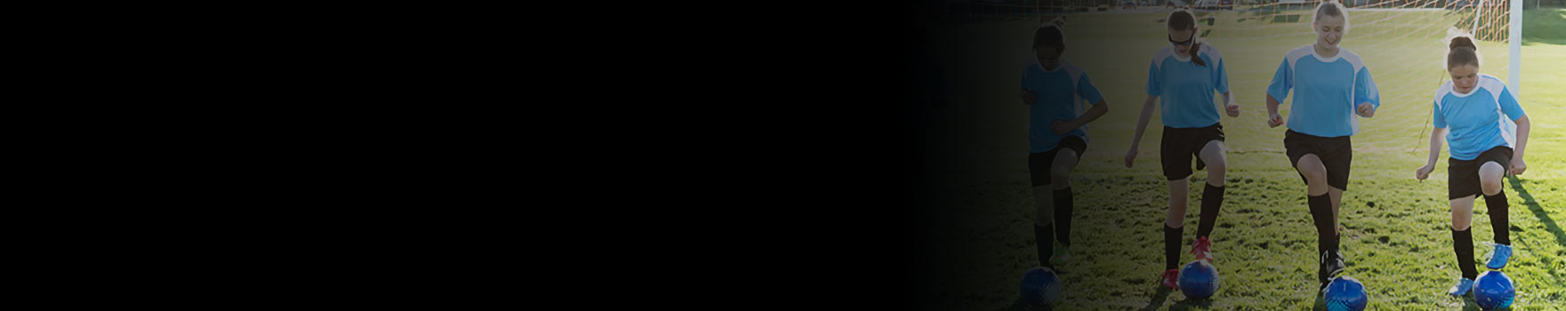 Youth playing soccer