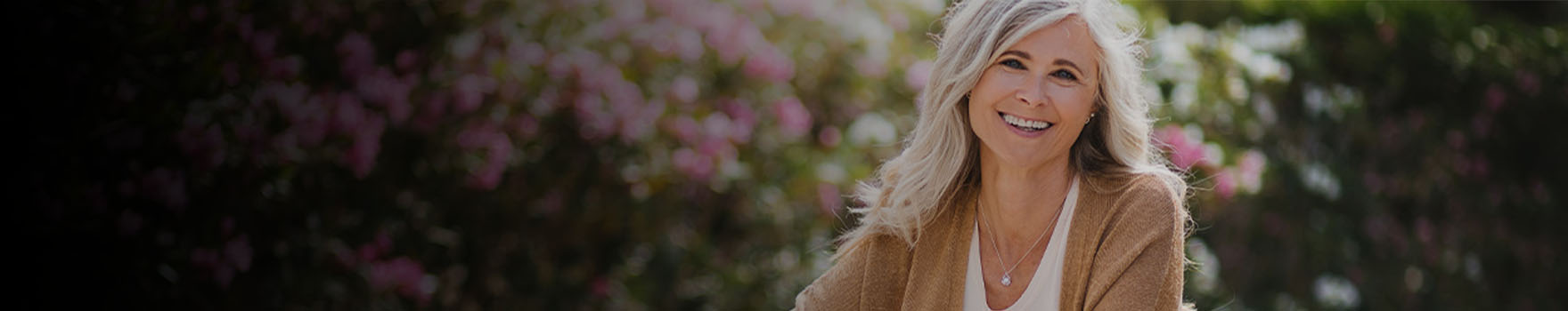 smiling woman in a garden