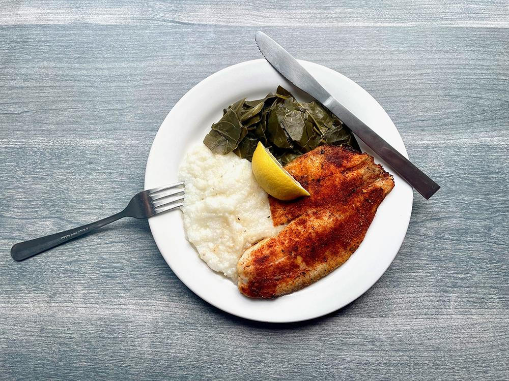 Blackened Tilapia with grits and collard greens
