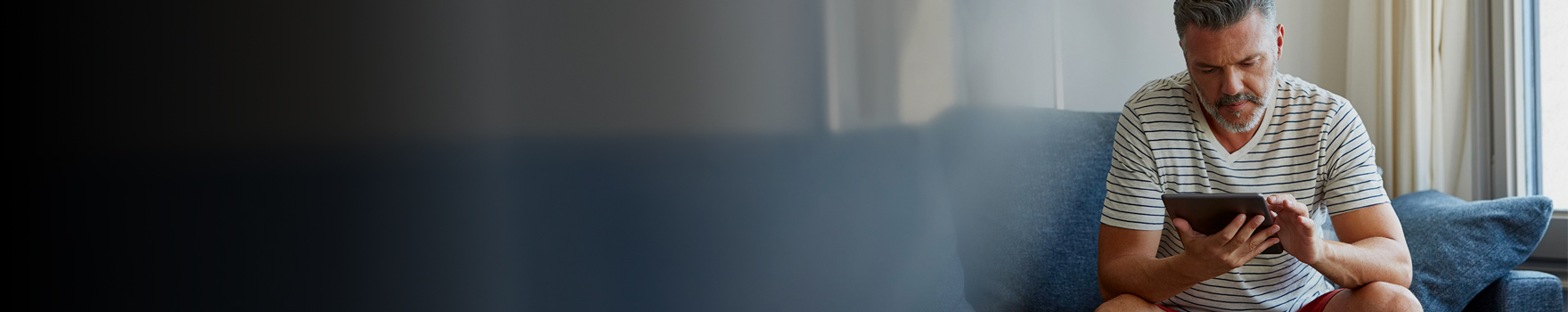 man paying his bill online