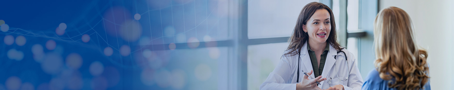 Doctor and patient speaking at an office. 