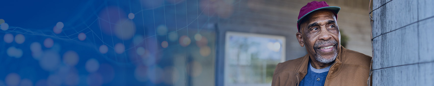 A man smiling at the sunset