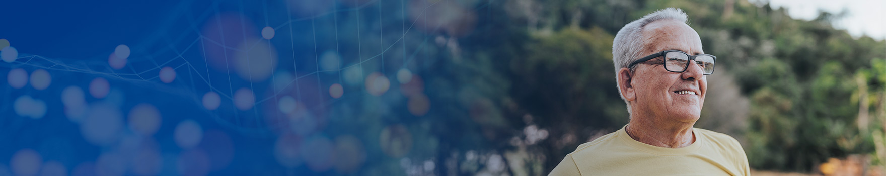 Man with glasses at a park