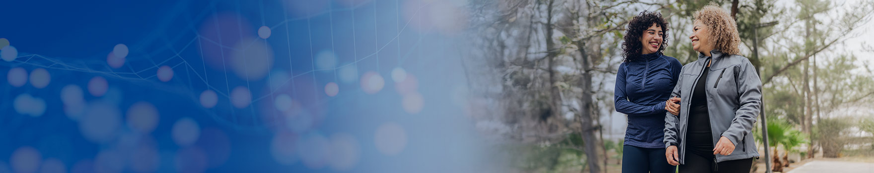 Two women walking on the park