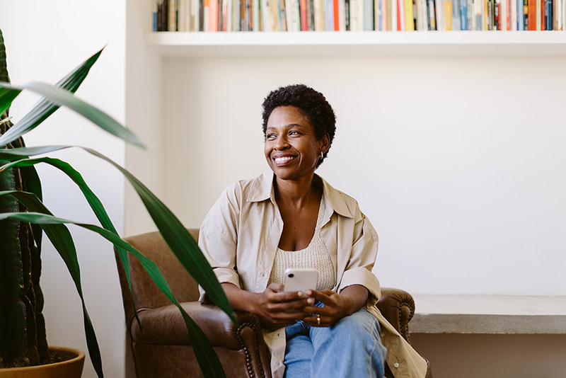 Woman smiling inside an office