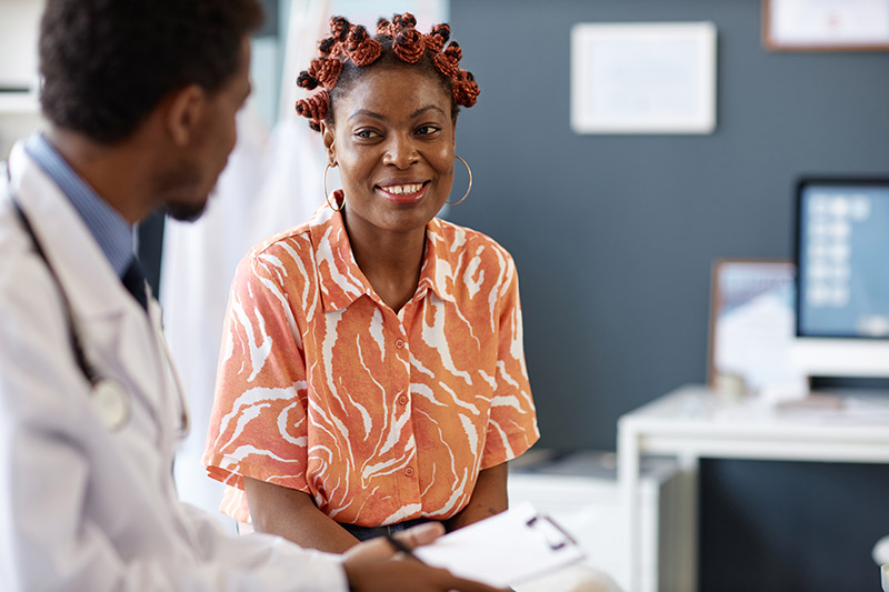 Patient receiving eye care advice in a clinical setting