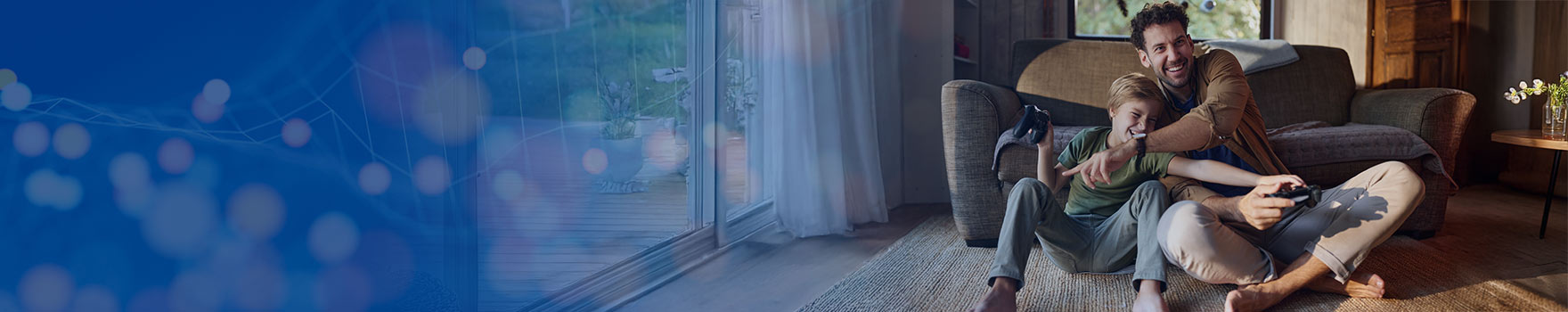 father and son playing video games