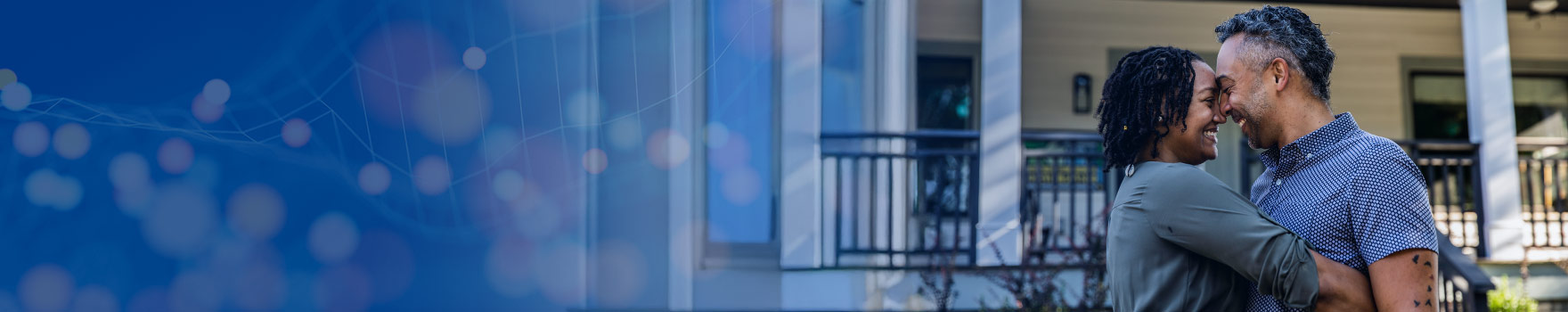 couple outside their home