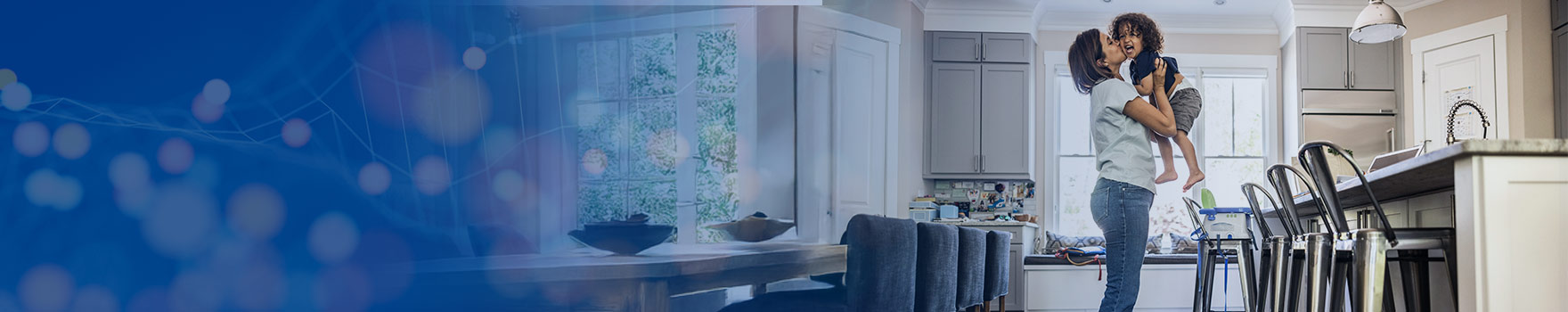 Mother kissing her son