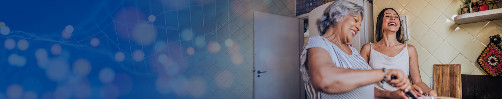 mother and daughter cooking together in the kitchen