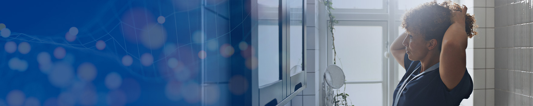 woman looking in the mirror