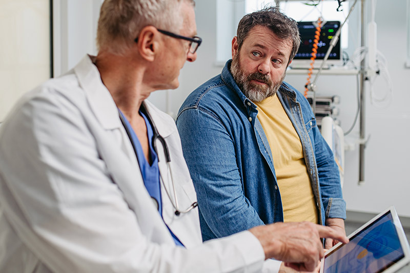 doctor talking to his patient