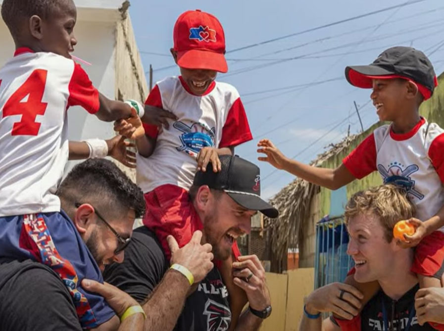 Bradley Pinion with Kids for Community Service