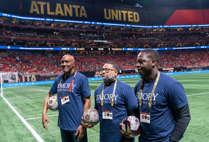 3 Men at Atlanta United Halftime on the field