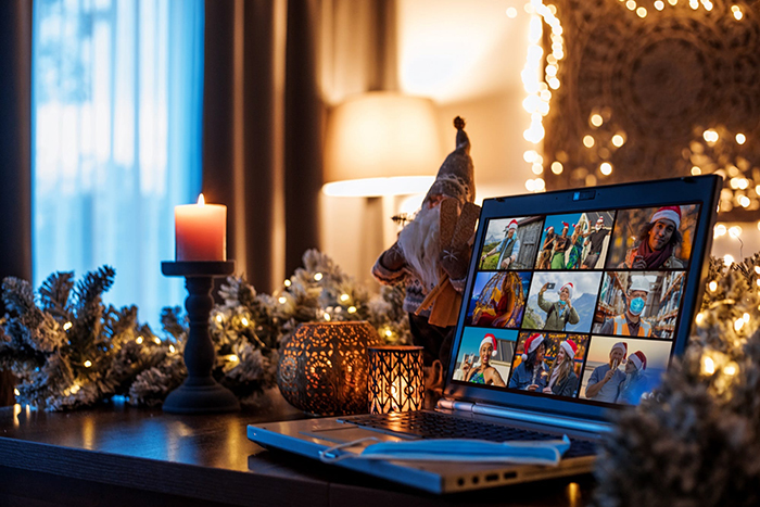 A computer with displaying an online family gathering