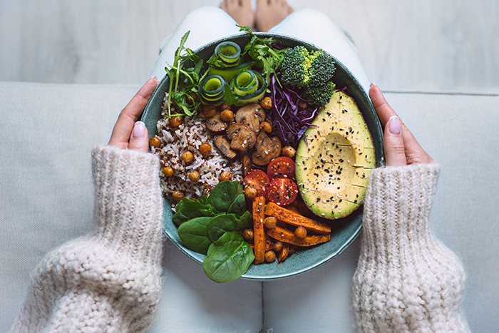 a plate full of grains and vegetables